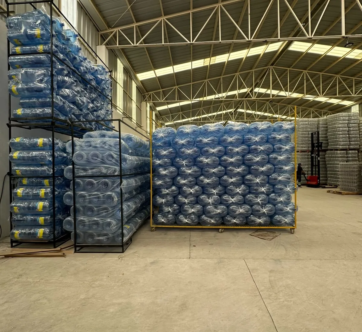 Racks de garrafón azul embolsado